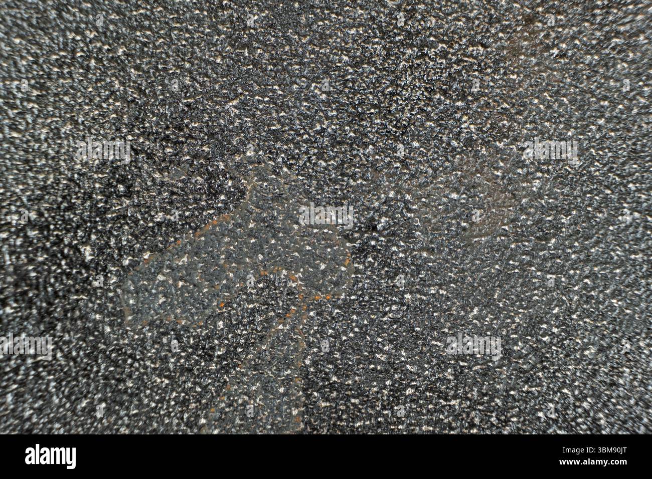 Rust stains on cast iron surface, macro. Stock Photo