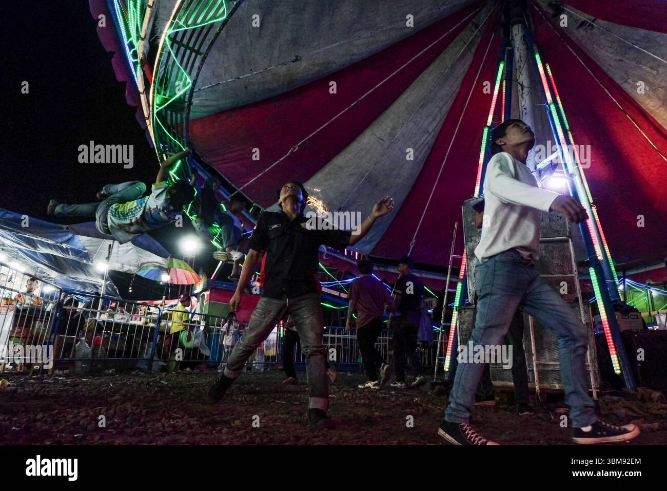 June 25, 2025, Garut, West Java, Indonesia: People enjoy the fun fair ...