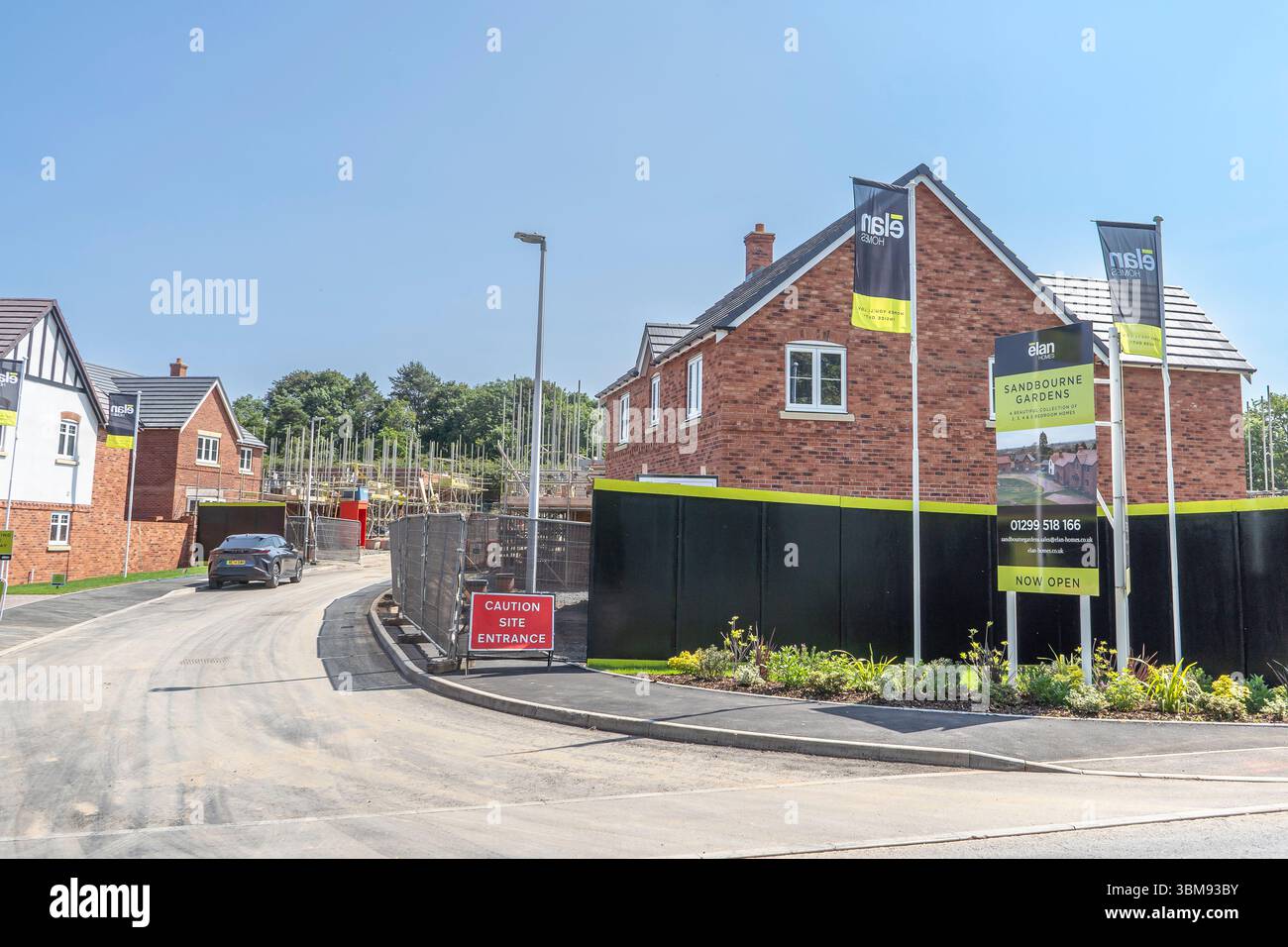 New build site entrance with both finished and part finished homes. Stock Photo