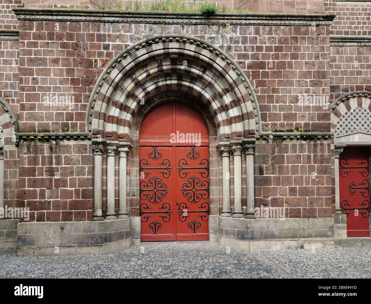 Porch of romanesque Basilica Saint Julien of Brioude. Haute loire. Auvergne Rhone Alpes. France. - Smartphone Captured Stock Image