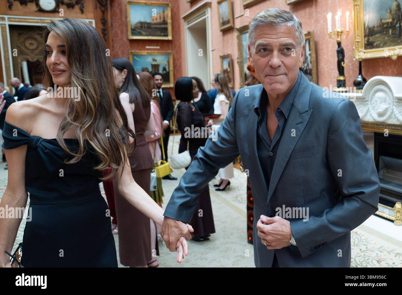 amal clooney dress king's trust awards in vintage Alexander McQueen Fall 2007 at The 50th Anniversary Celebration Amal and George Clooney attending