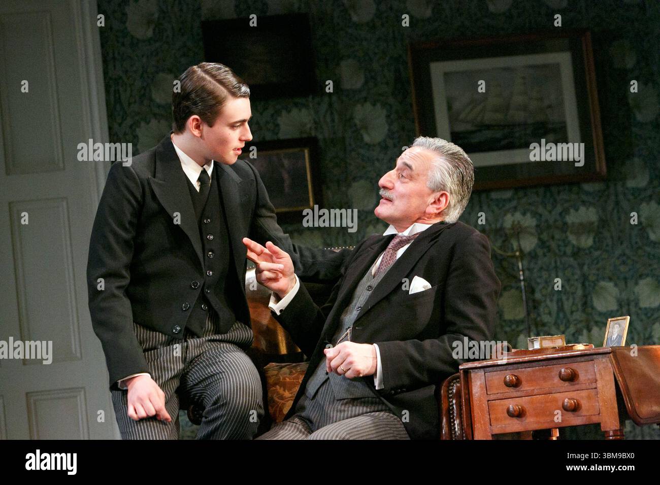 l-r: Charlie Rowe (Ronnie Winslow), Henry Goodman (Arthur Winslow) in ...