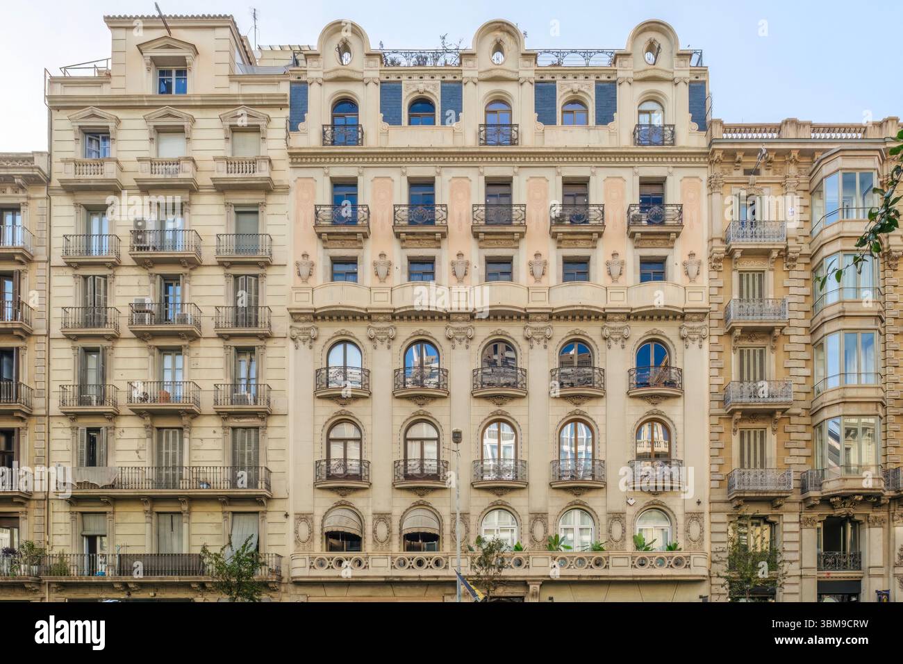 Ornate Art Nouveau Facade Of A Historic Building In Barcelona. European architecture, decorative details, urban residential, elegant design, classic b Stock Photo