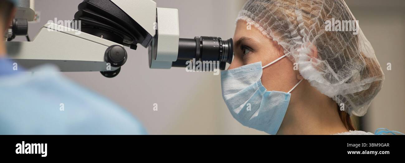 Microscope Screen Operating Room Woman Examining Sample Using Microscope in Operating Room Stock Photo ...