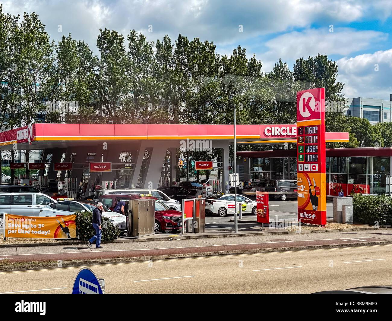 Circle k gas station in Dublin, Ireland, featuring cars, pumps, fuel ...