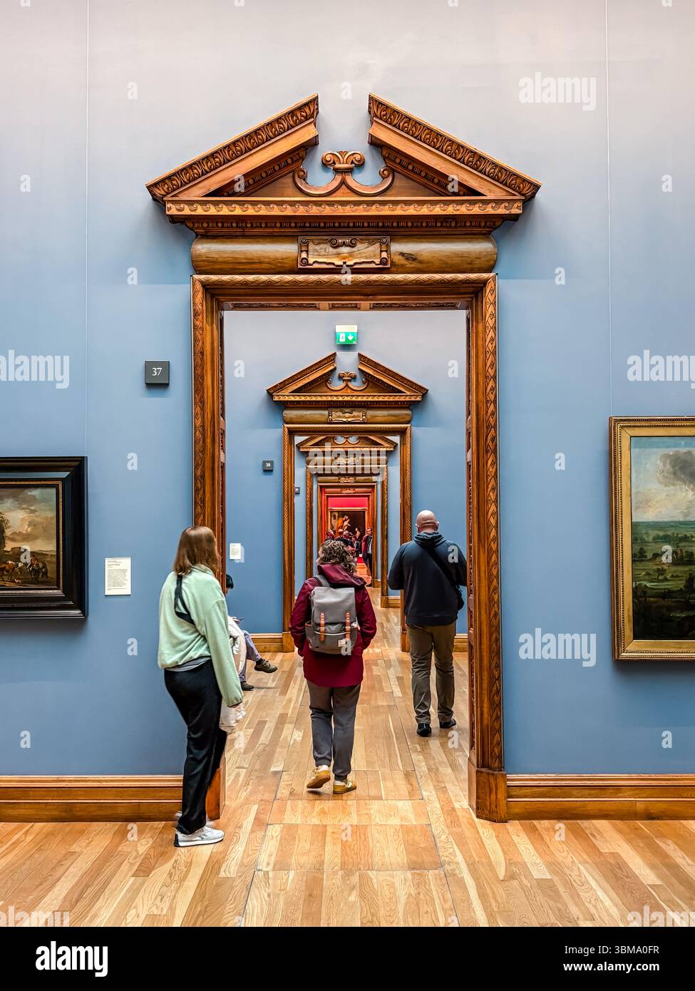 National Gallery, Dublin, Ireland interior with people walking through ...