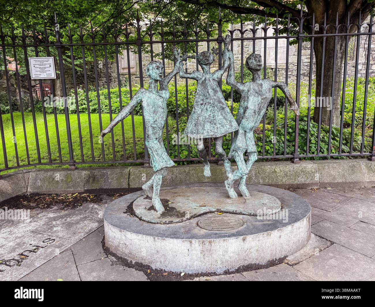 The Millennium Child Monument is a bronze sculpture of three children dancing located on O’Connell Street, Dublin, Ireland. Stock Photo