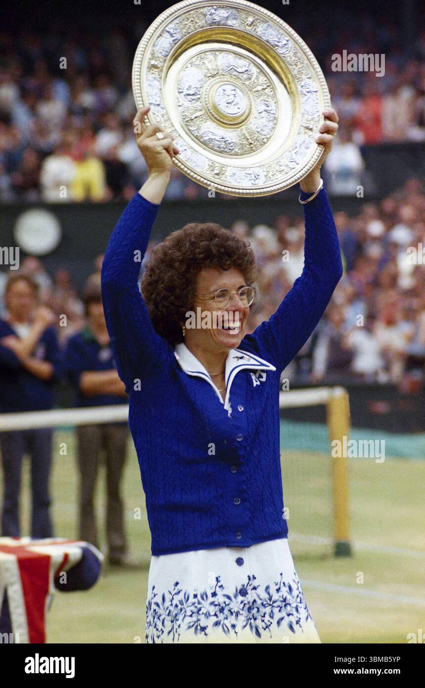 FILE - U.S. tennis star Billie Jean King holds up trophy after winning ...