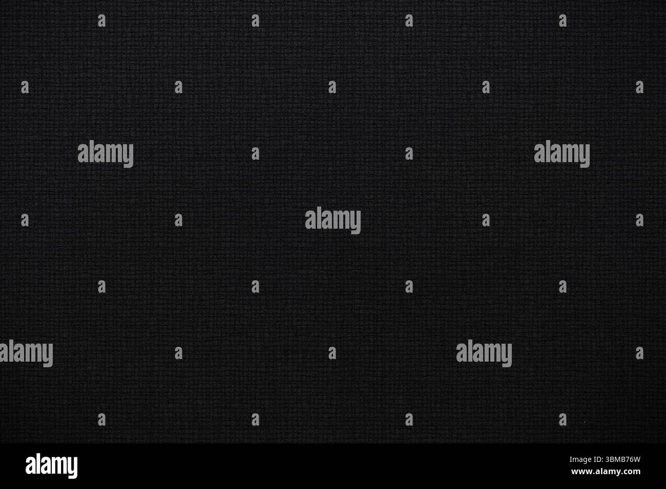 Dark woven texture is creating uniform grid background in flat design, highlighting subtle pattern Stock Photo