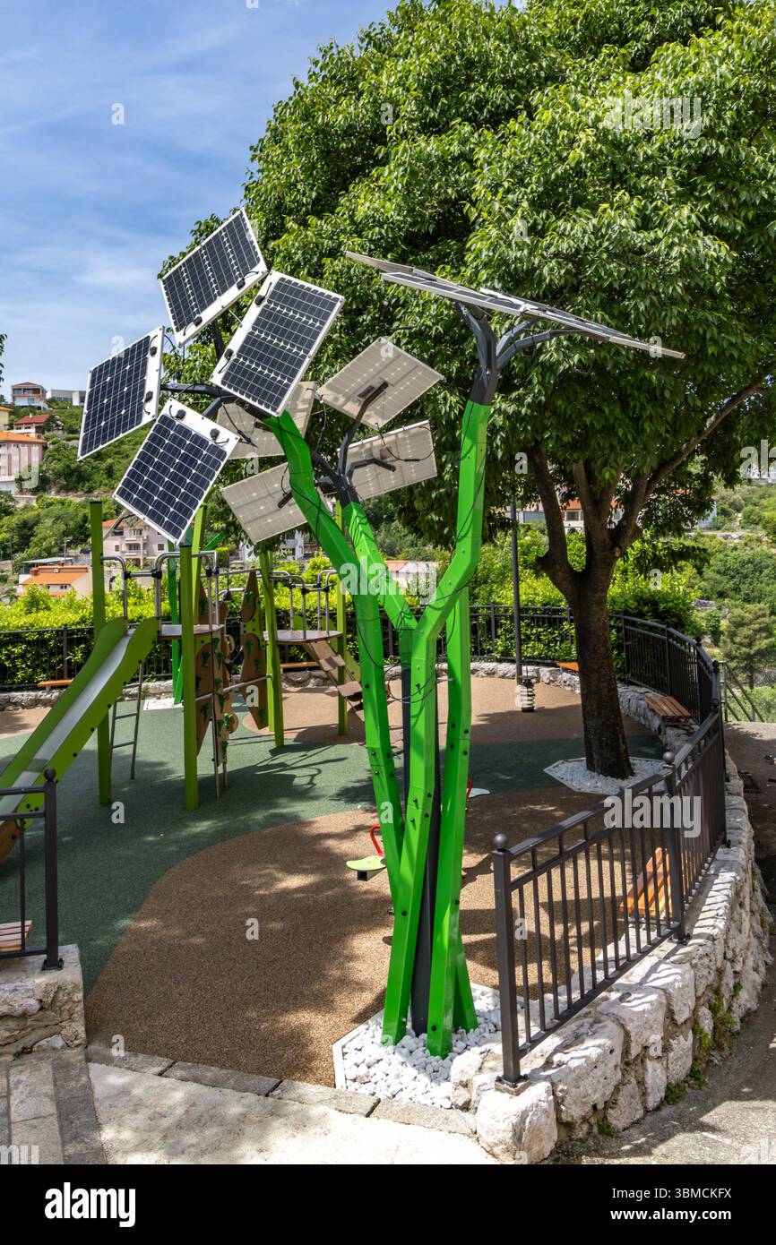 Photovoltaic panels installed on a metal structure resembling a tree ...
