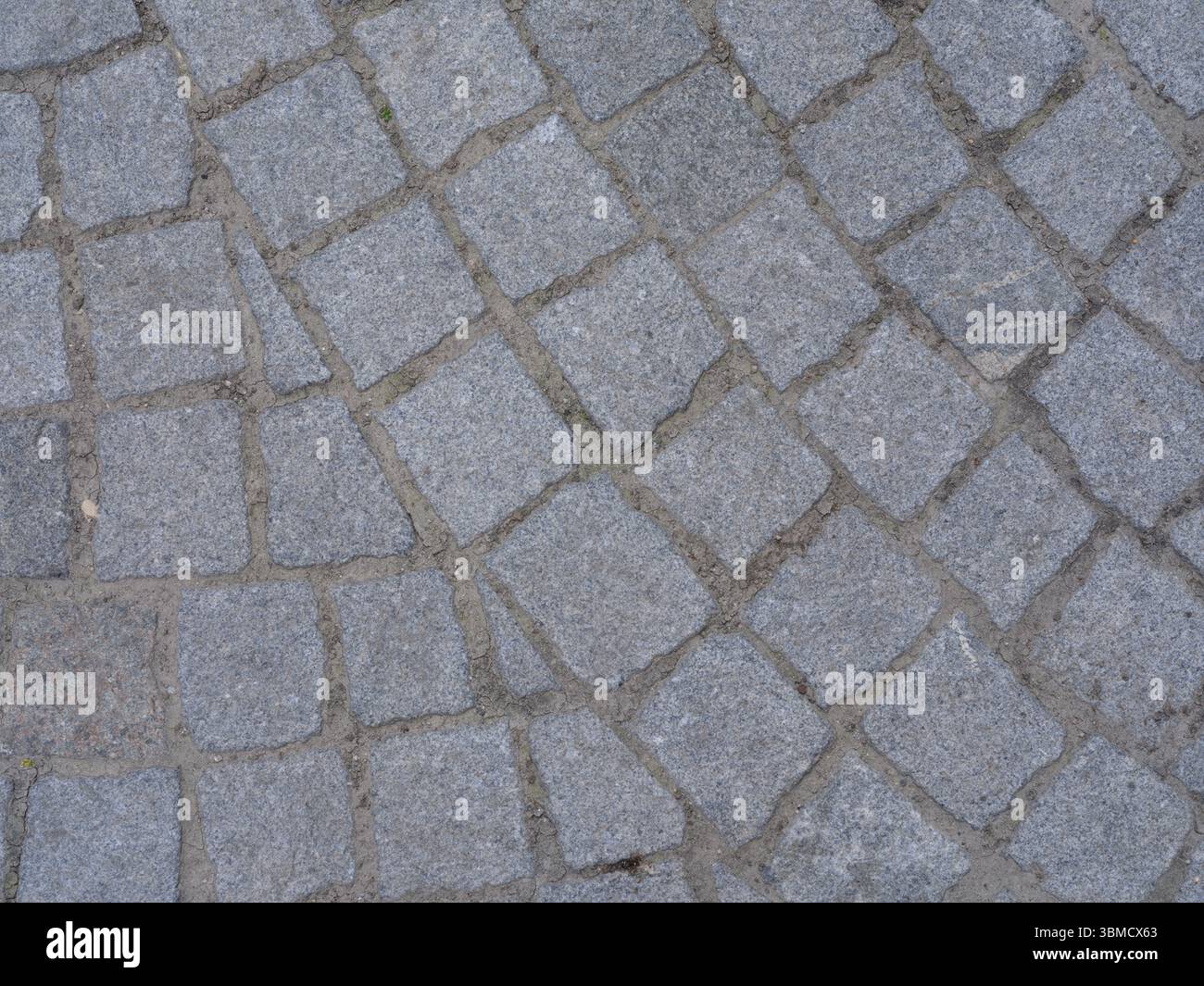 Close-up of pavement texture with rectangular paving slabs with ...