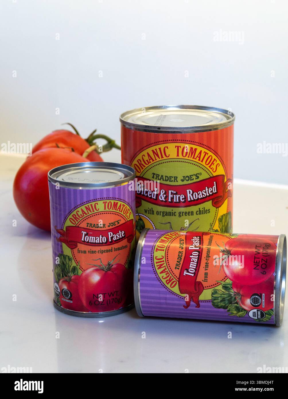 Trader Joe's grocery store sells a full line of canned  tomato products, 2025, United States Stock Photo
