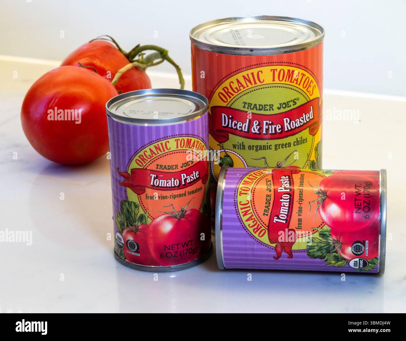 Trader Joe's grocery store sells a full line of canned  tomato products, 2025, United States Stock Photo