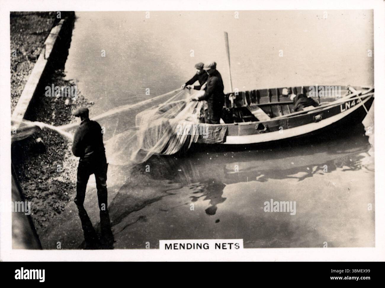 1930s fishing with nets hi-res stock photography and images - Alamy