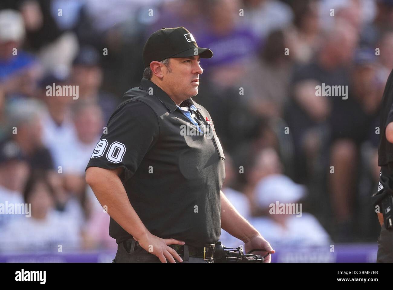 Home plate umpire Mark Ripperger (90) in the first inning of a baseball ...