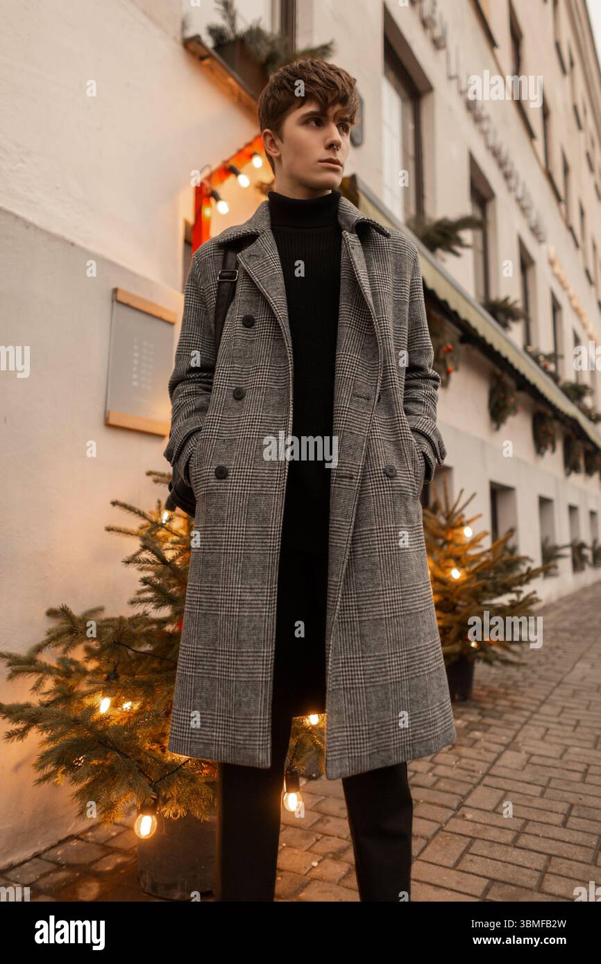 Man standing between two trees hi-res stock photography and images - Alamy