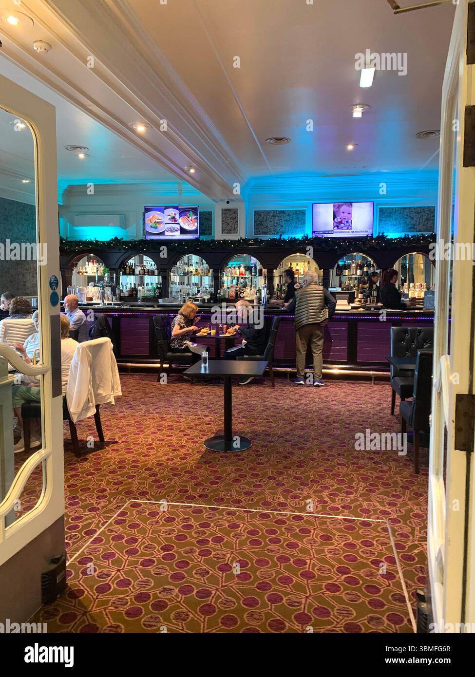 Aberdeen Scotland City Centre gardens garden Park sign signs grass tower building new style ornament Hotel stained glass window  walking people - Smartphone Captured Stock Image