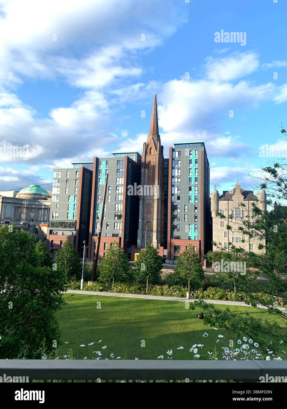 Aberdeen Scotland City Centre gardens garden Park sign signs grass tower building new style ornament Hotel stained glass window  walking people - Smartphone Captured Stock Image
