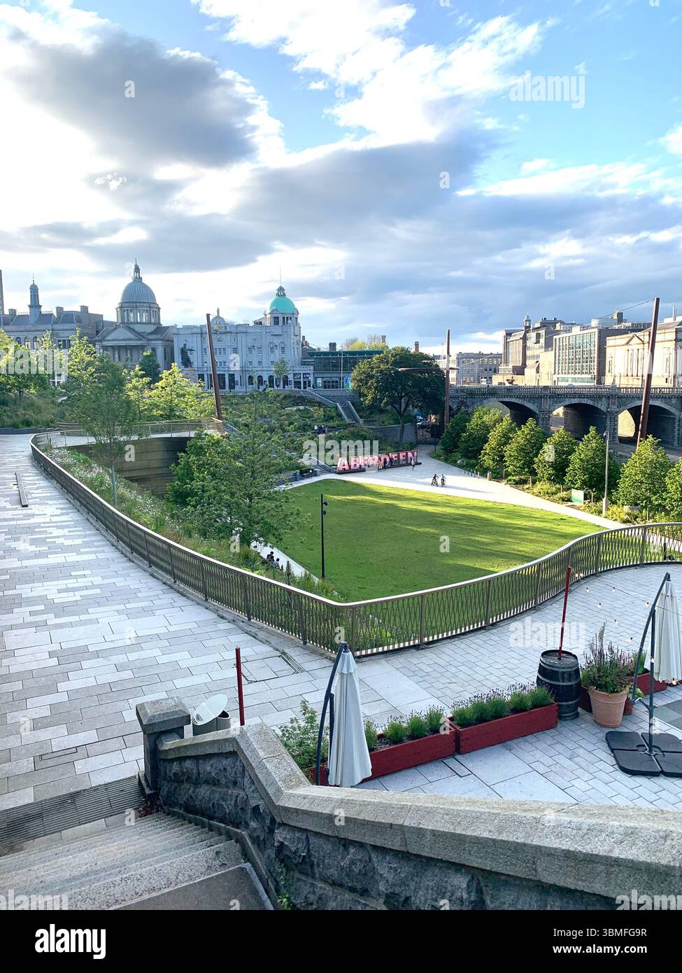 Aberdeen Scotland City Centre gardens garden Park sign signs grass tower building new style ornament Hotel stained glass window  walking people - Smartphone Captured Stock Image