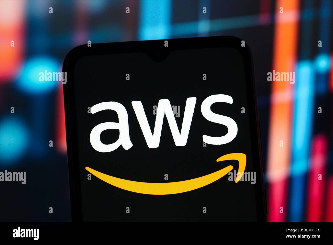 In this photo illustration, the Amazon Web Services (AWS) logo is seen displayed on a smartphone screen. Stock Photo
