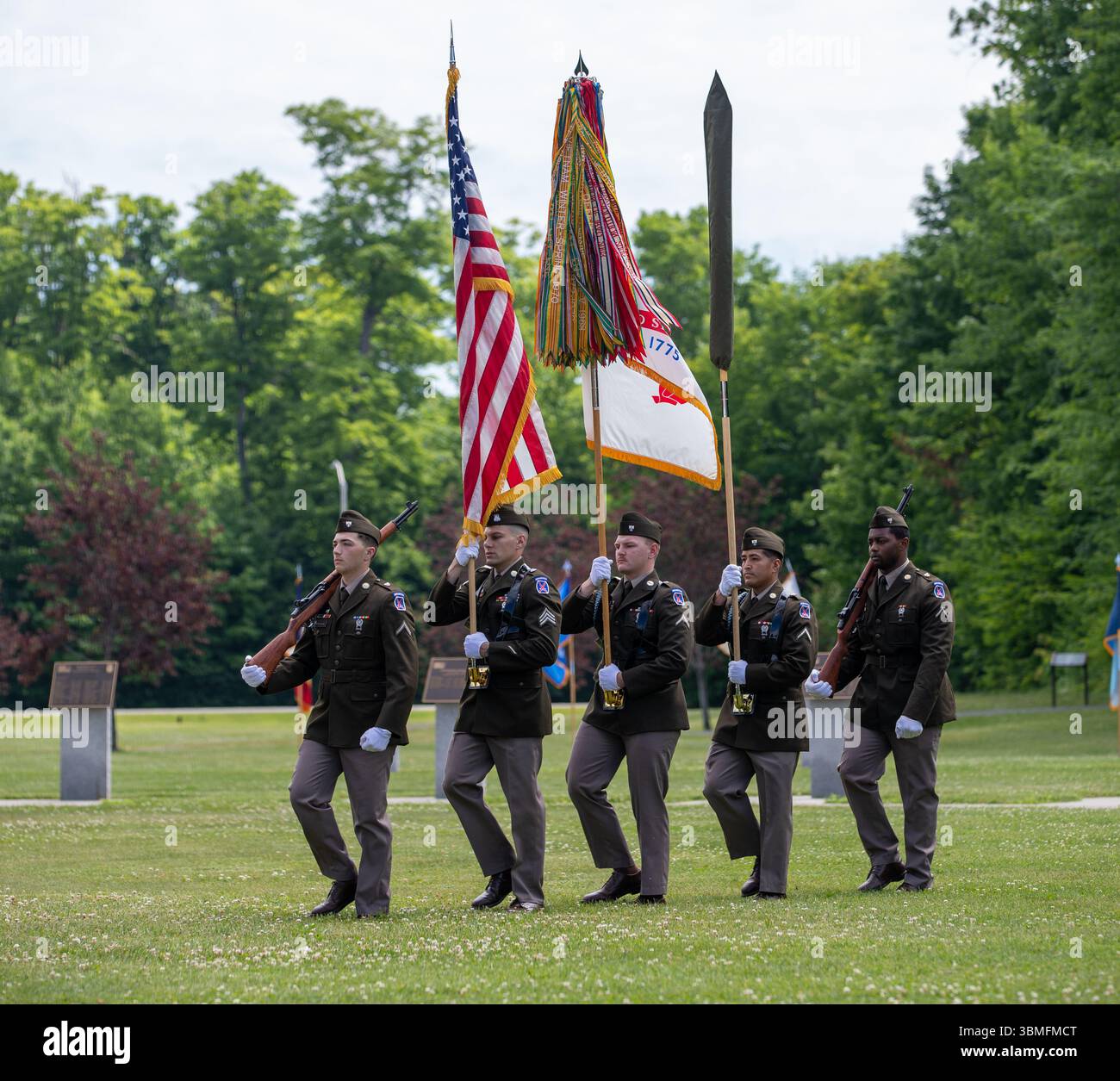 Soldiers assigned to the 10th Mountain Division (LI) color guard march ...