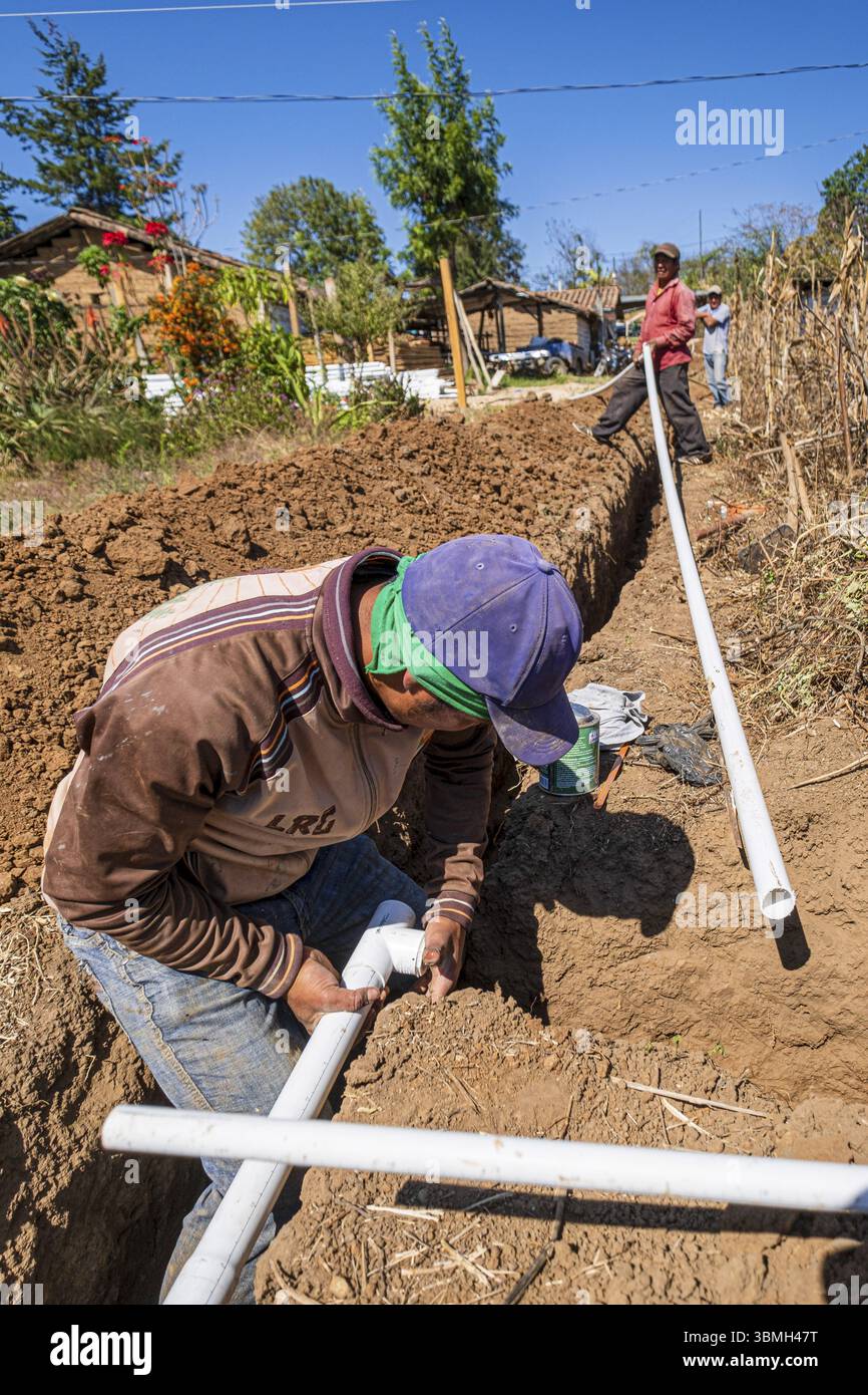 Community construction of drinking water pipes, Xullmal, Guatemala ...