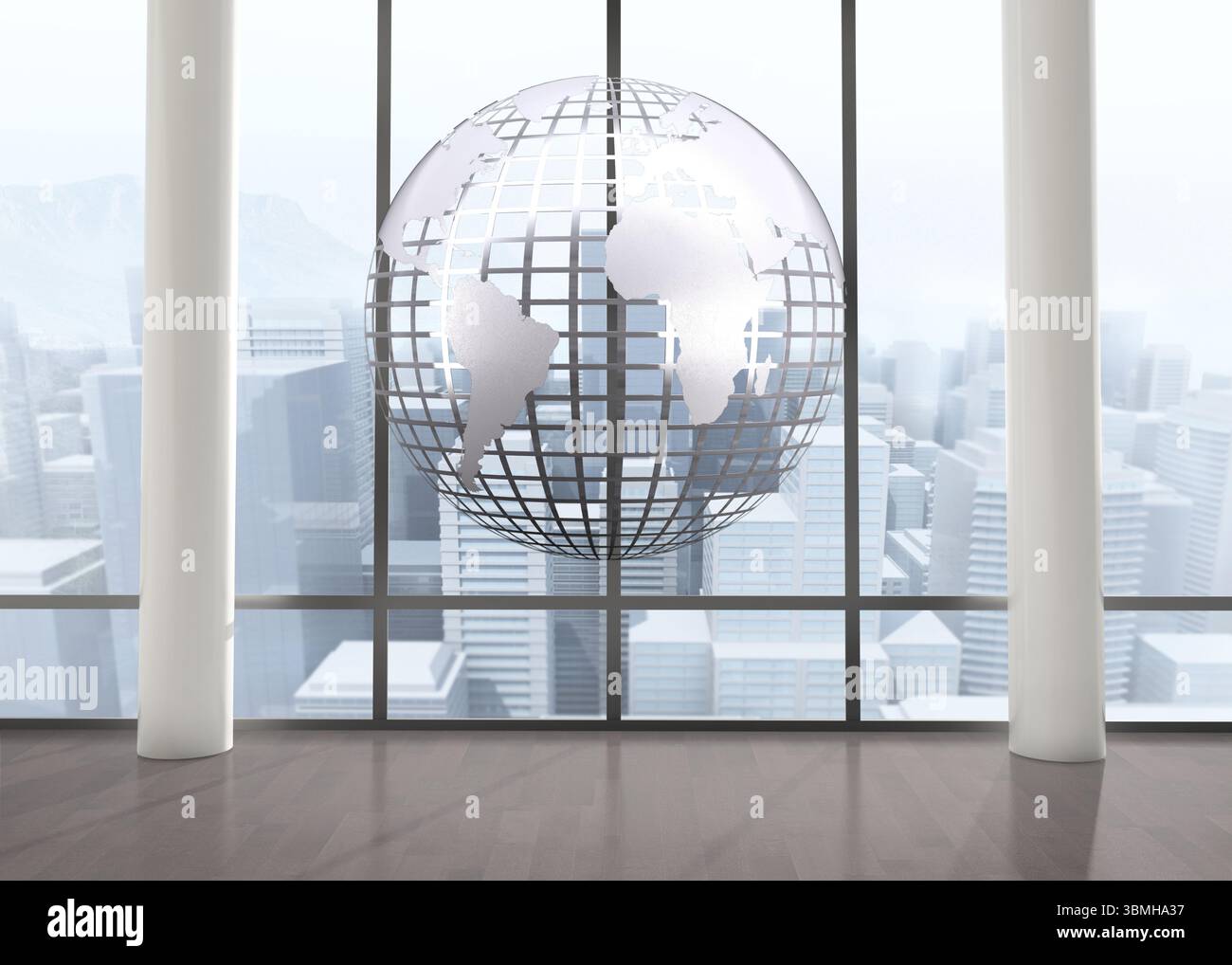 Silver globe floating in room Stock Photo