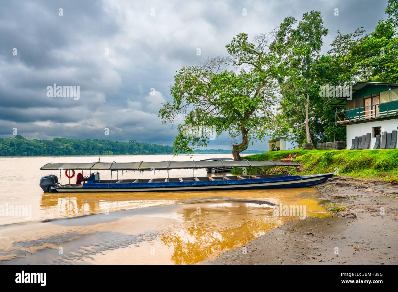 Motorized Canoe moored at Napo River, Amazon, Ecuador Stock Photo