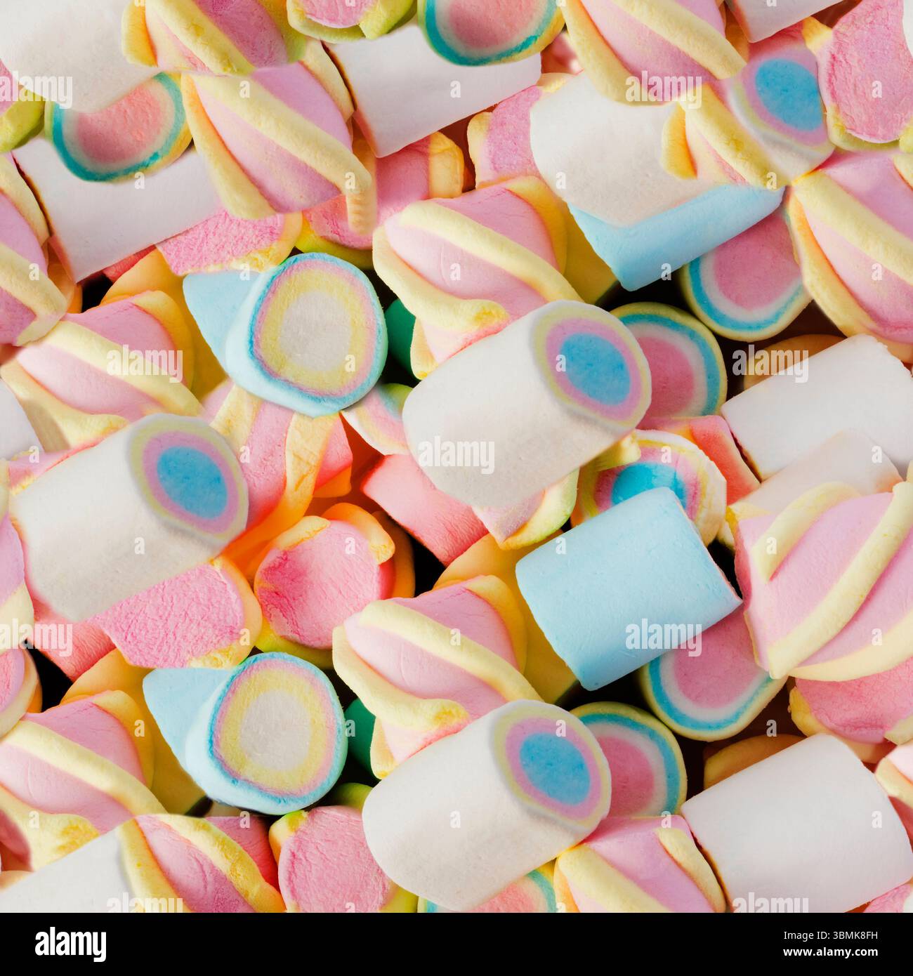 Seamless 4k photo texture of colored marshmallow pile. Stock Photo