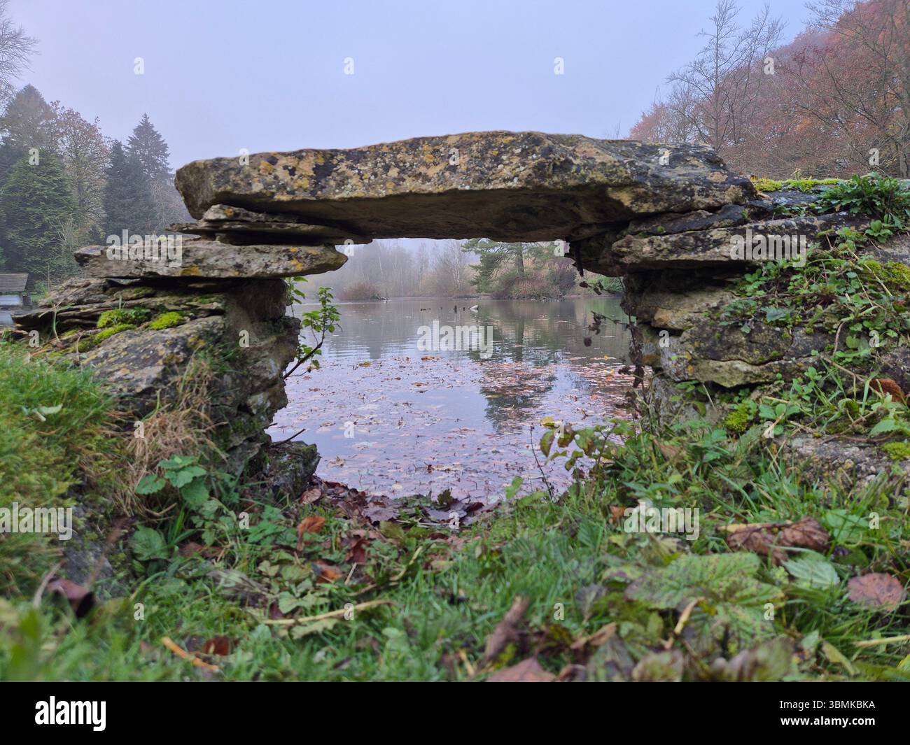 Lake through a stone arch - Smartphone Captured Stock Image