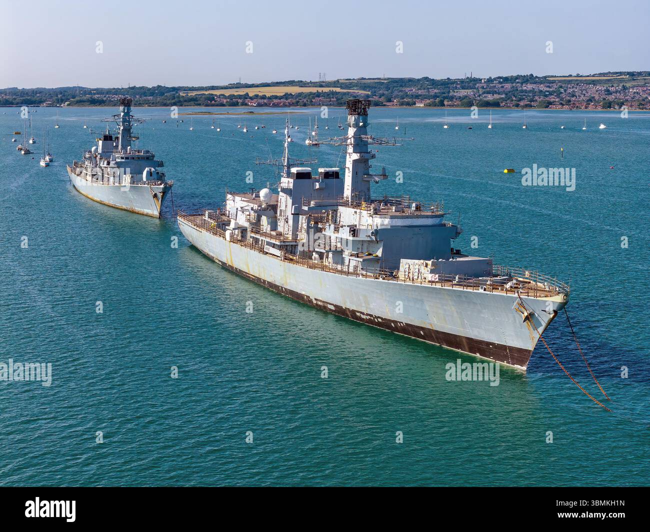 The decommissioned Type 23 frigates Northumberland and Montrose laid-up awaiting disposal in Portsmouth Harbour. Stock Photo