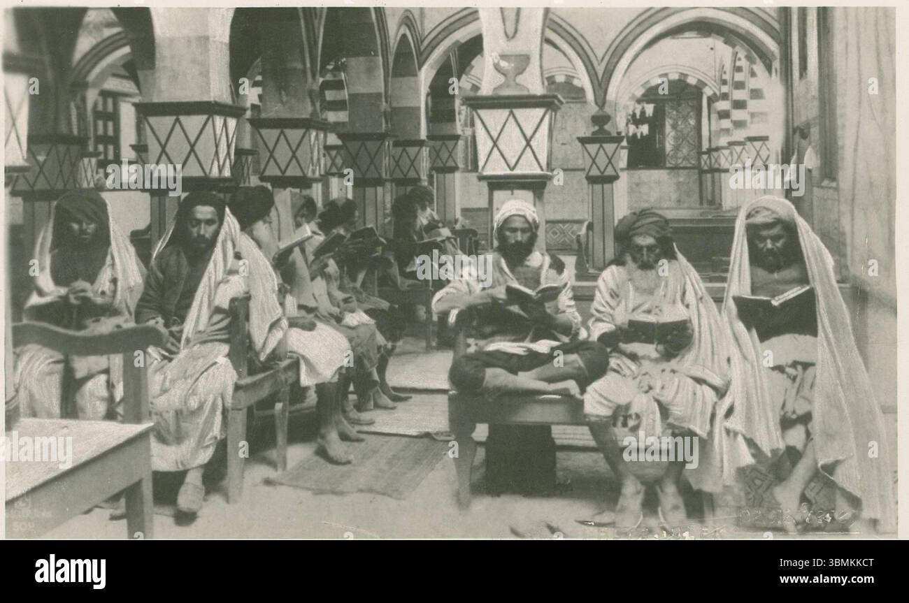 Rabbis praying in the synagogue of Djerba Stock Photo - Alamy