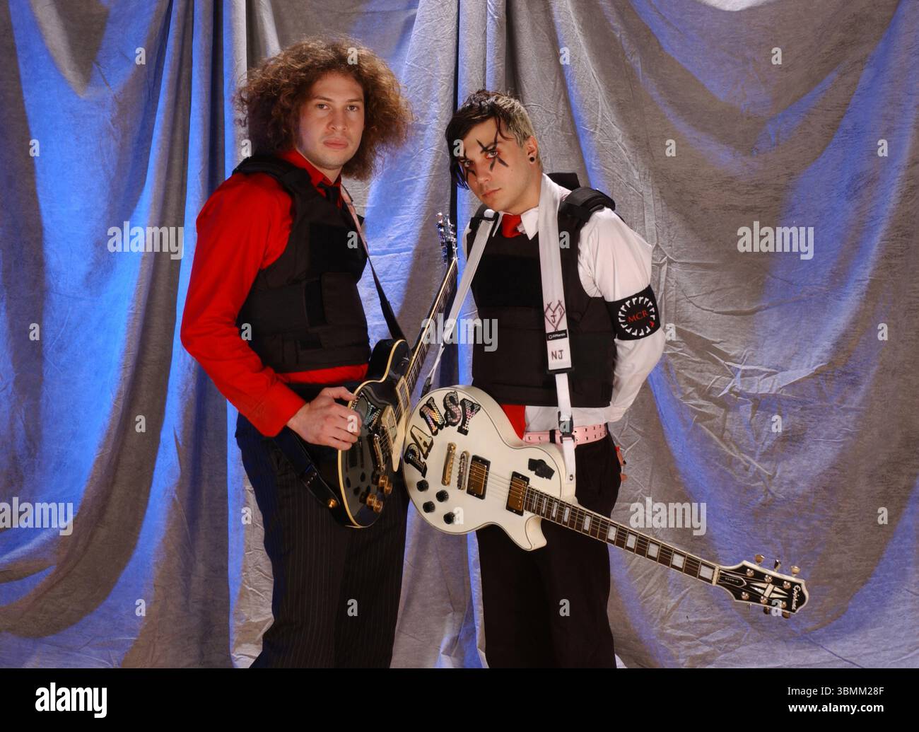 POMPANO BEACH FL - FEBRUARY 19: Ray Toro and Frank Iero of My Chemical Romance pose during a photo session at The Pompano Beach Amphitheater on February 19, 2005 in Pompano Beach, Florida. Credit: mpi04 / MediaPunch Stock Photo
