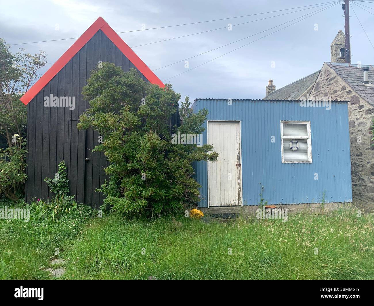 Aberdeen Scotland fishermen's houses fisherman view views garden gardens nice looking pretty outside front building buildings old fence fenced - Smartphone Captured Stock Image