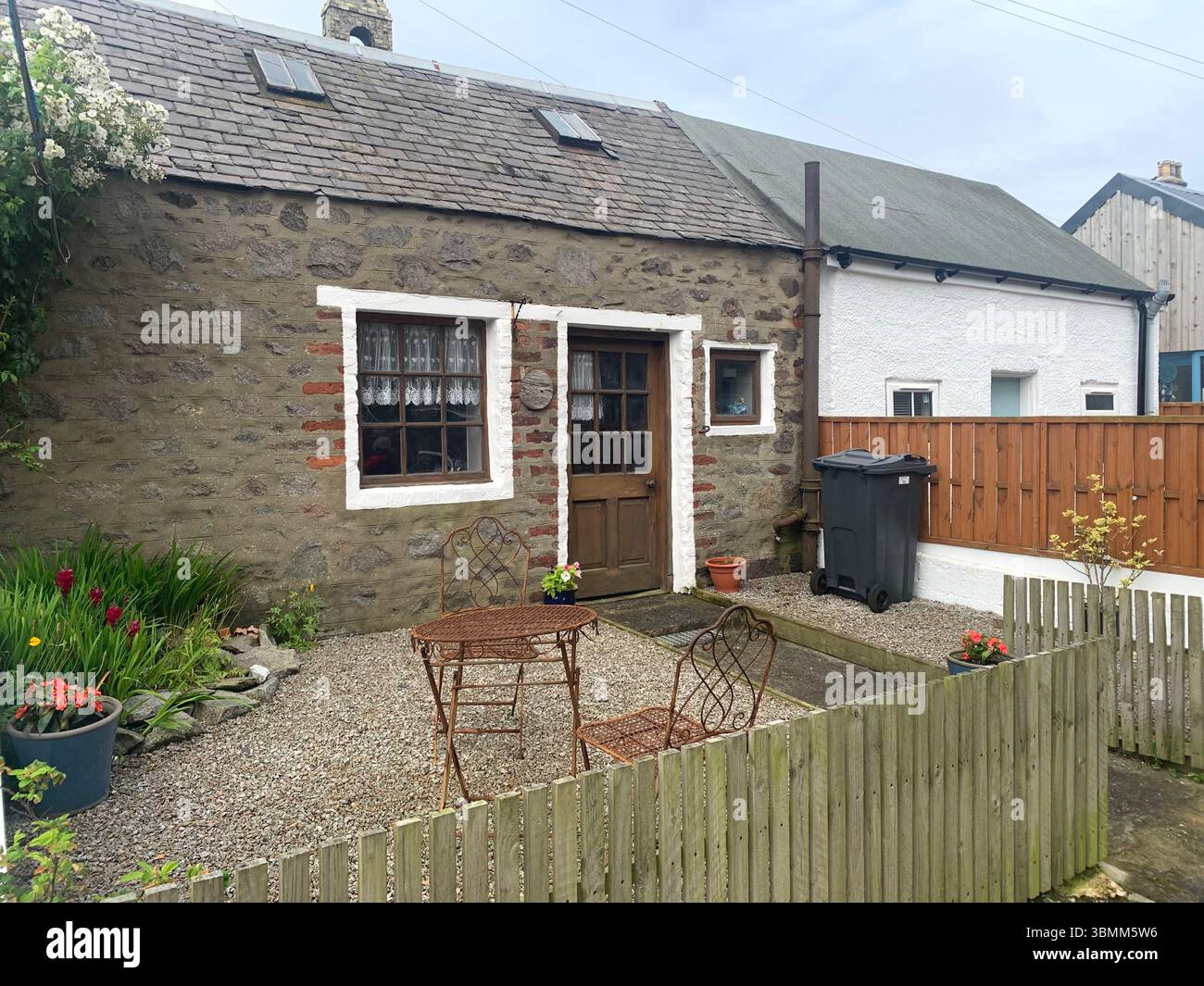 Aberdeen Scotland fishermen's houses fisherman view views garden gardens nice looking pretty outside front building buildings old fence fenced - Smartphone Captured Stock Image
