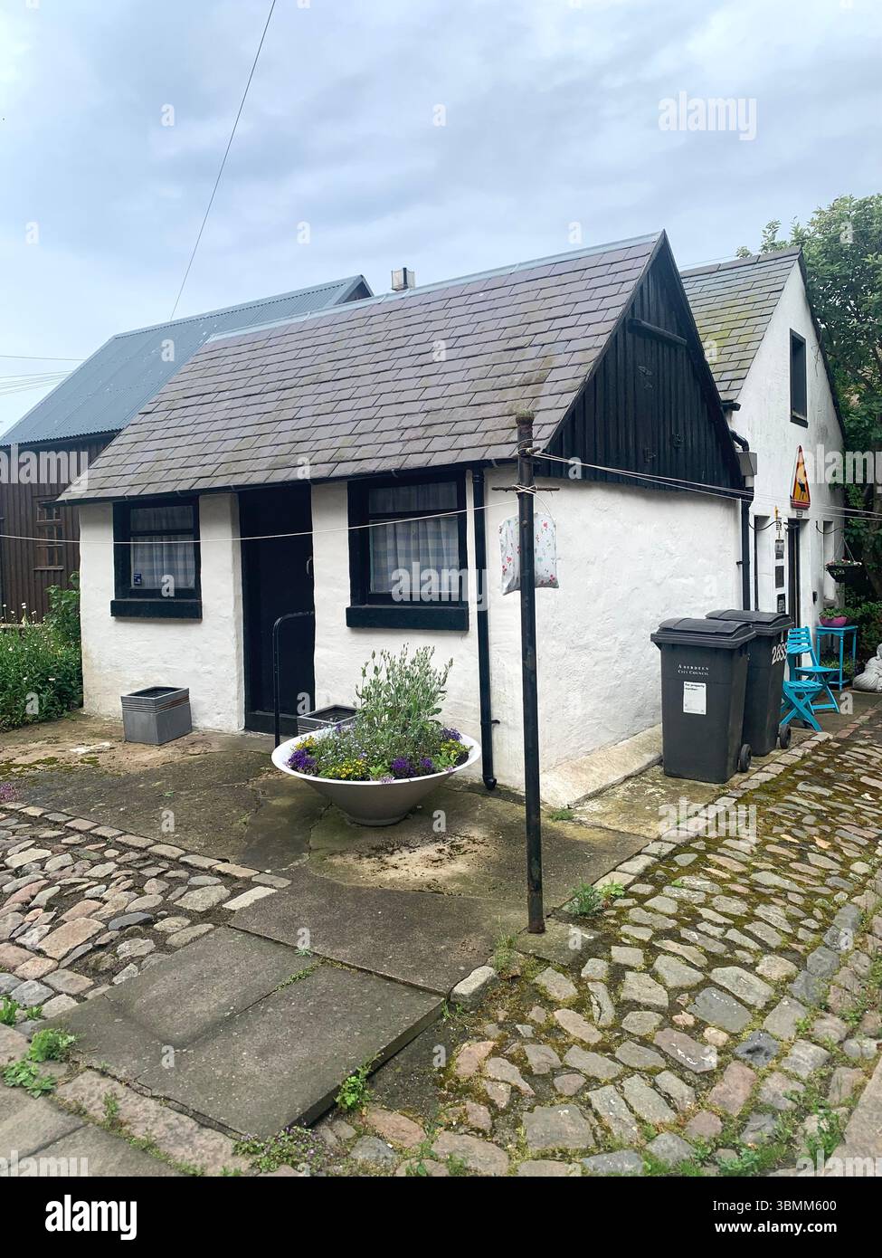 Aberdeen Scotland fishermen's houses fisherman view views garden gardens nice looking pretty outside front building buildings old fence fenced - Smartphone Captured Stock Image