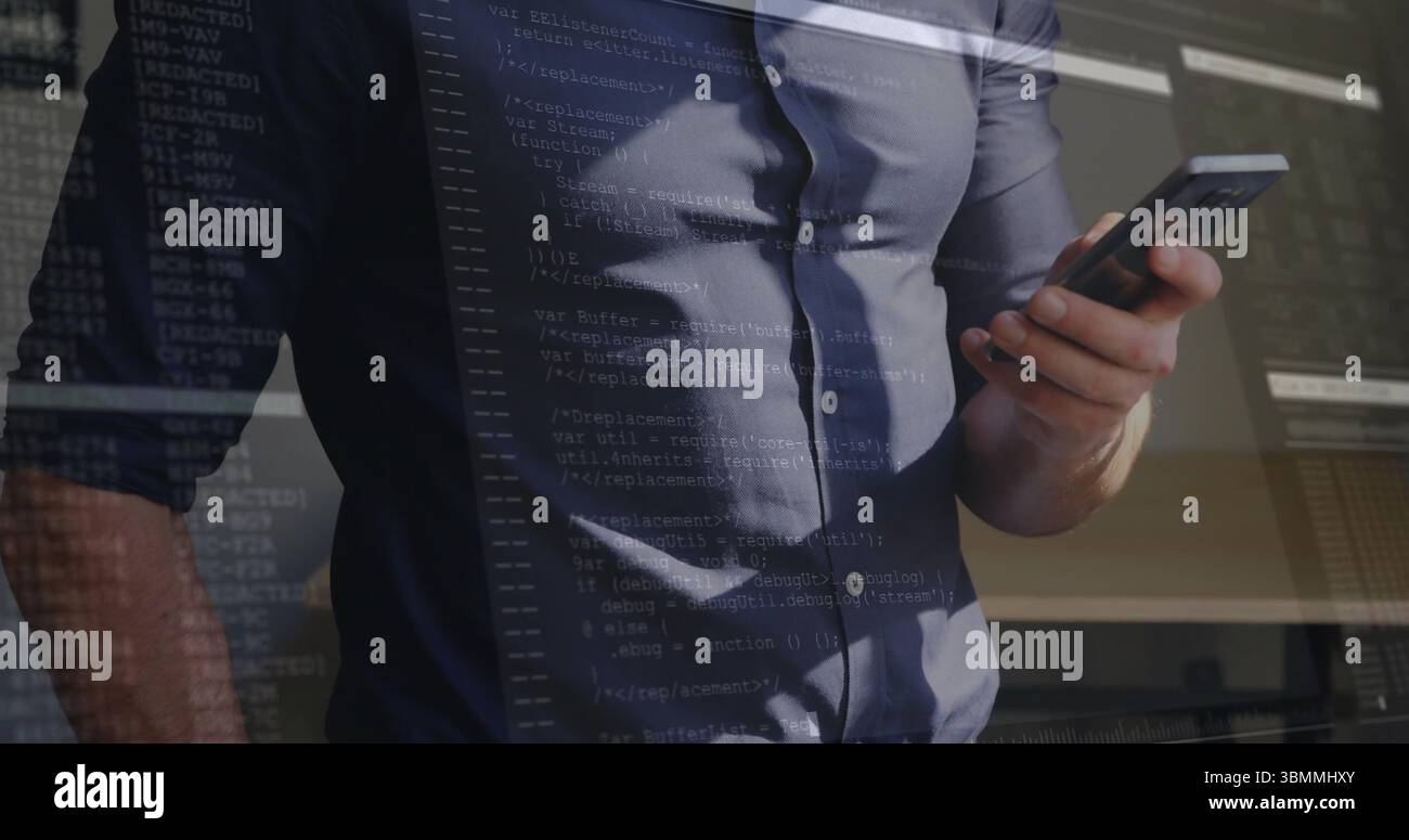 Holding smartphone developer in button-down shirt reviewing code at office, with code overlay Stock Photo