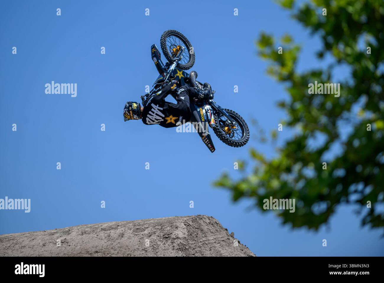 Colby Raha jumps his dirt bike in a practice session of the Moto X ...
