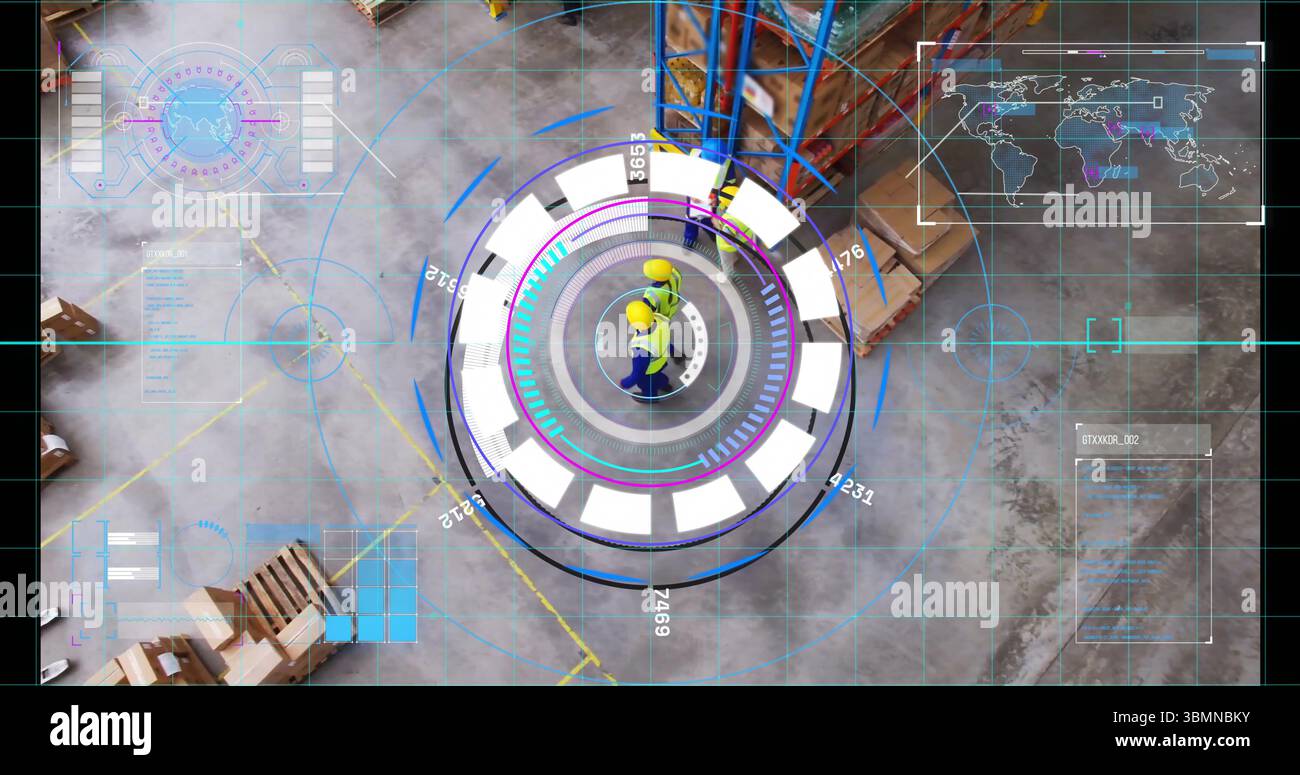 Monitoring two workers wearing yellow hard hats using holographic interface at warehouse with racks Stock Photo