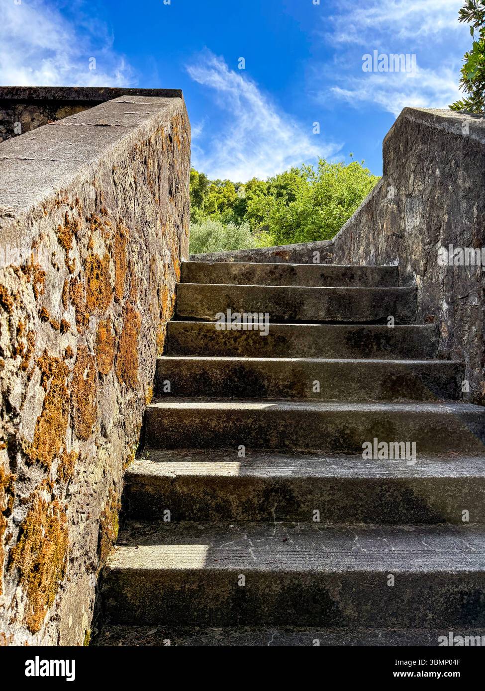 Stone staircase leading to blue sky Stock Photo
