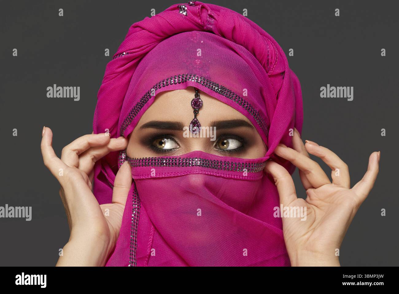 Young woman wearing pink hijab hi-res stock photography and images - Alamy