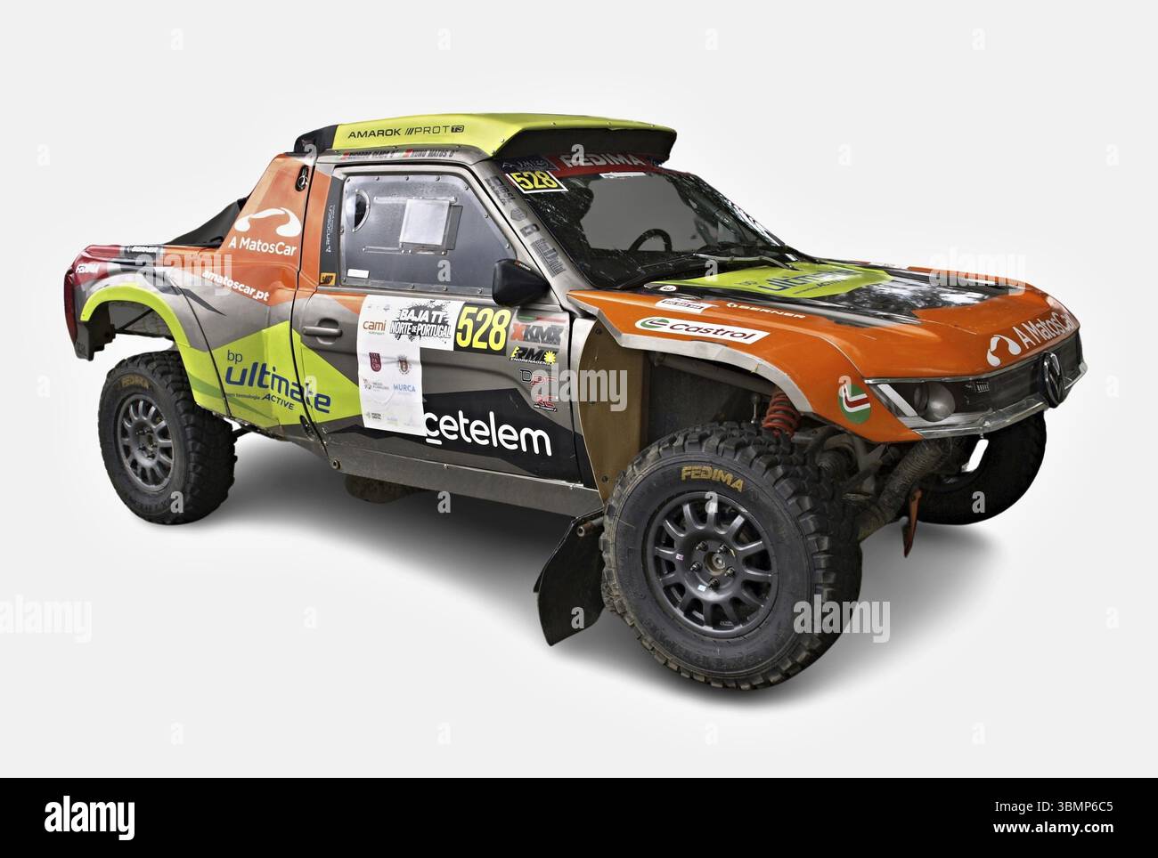 Open Rally Trucks Powerful off-road racing pickup truck waiting at the starting line of a ...