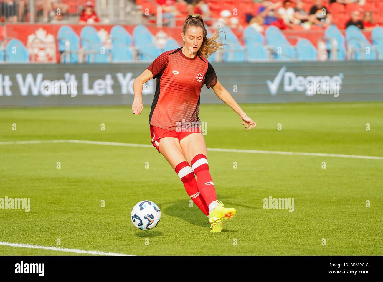 Jordyn Huitema #9 of Canada kick the ball before the International