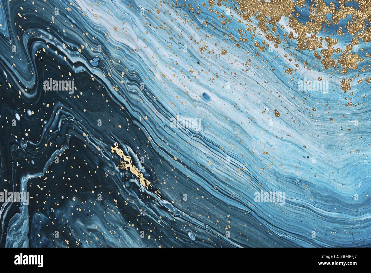 Fluid Art acrylic paints. Abstract mixing turquoise paint waves. Liquid golden flows splashes. Marble effect background or texture Stock Photo
