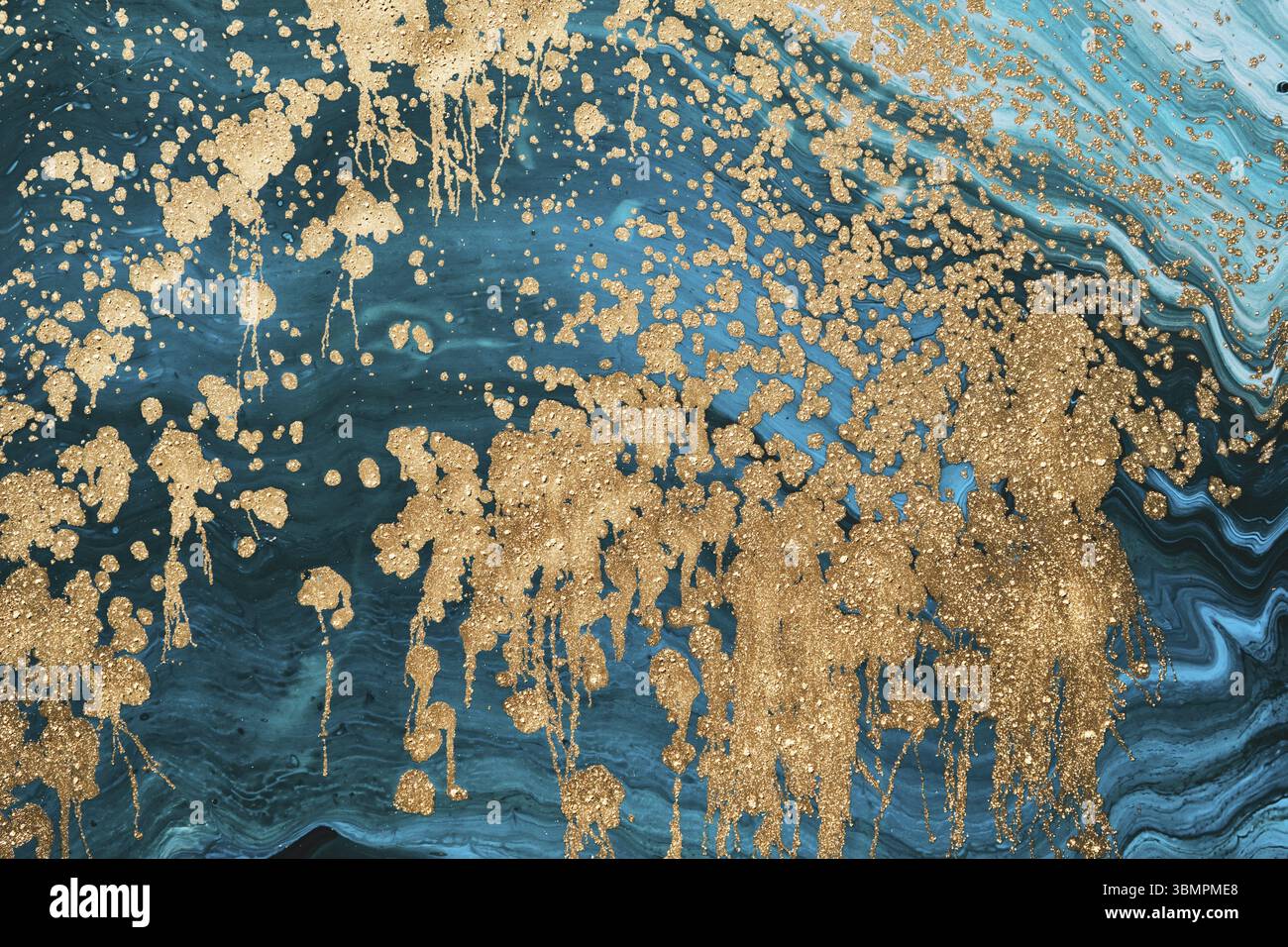 Fluid Art acrylic paints. Abstract mixing turquoise paint waves. Liquid golden flows splashes. Marble effect background or texture Stock Photo