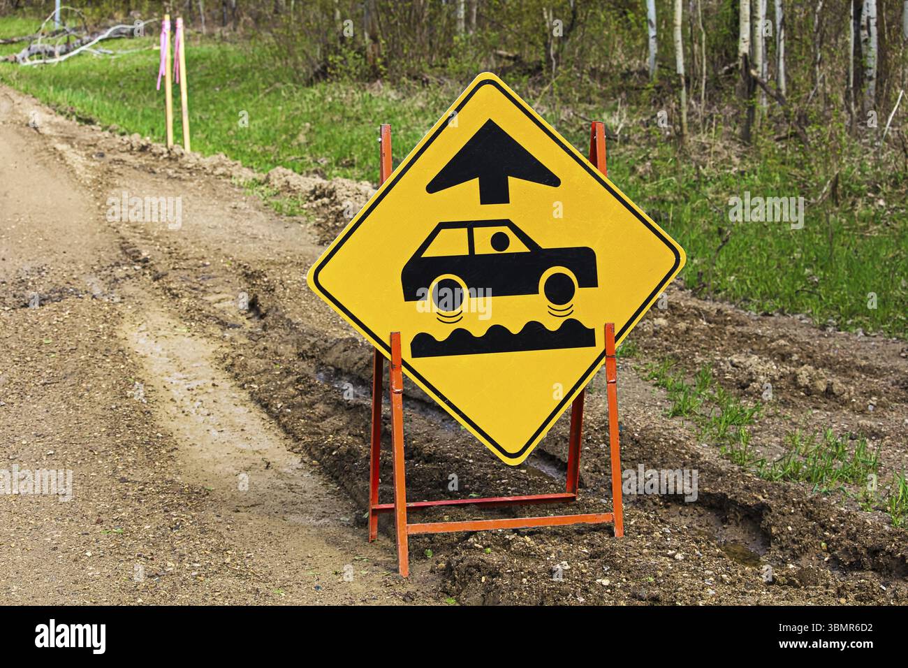 Closeup of a bumpy road ahead sign Stock Photo