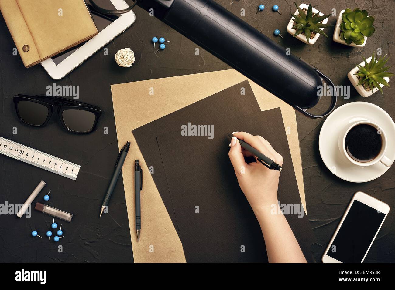 Architect working on blueprint. Architects workplace - architectural project, blueprints, tablet pc. Construction concept. Engineering tools. Copy spa Stock Photo