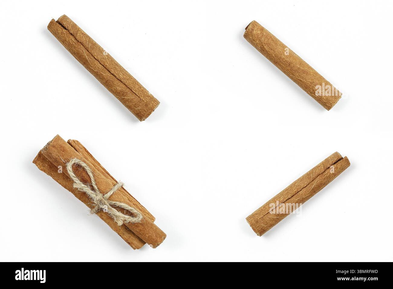 Collage. cinnamon sticks on white isolated background Stock Photo