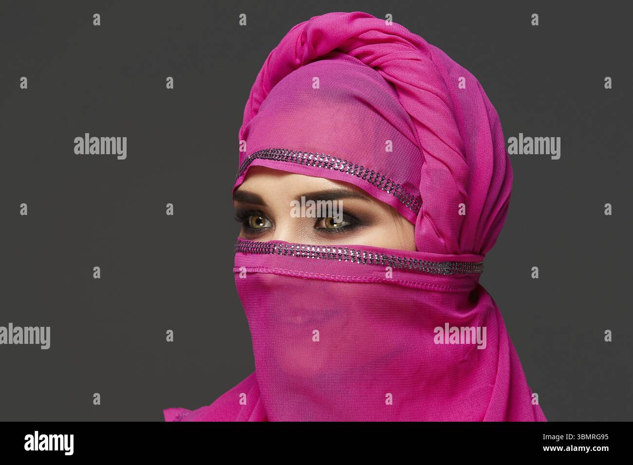 Young woman wearing pink hijab hi-res stock photography and images - Alamy