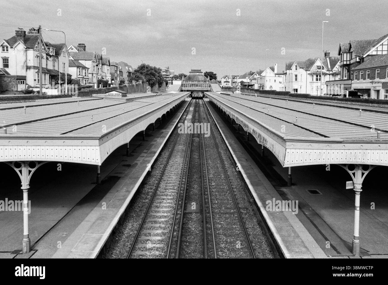Bexhill-On-Sea railway station and surrounding houses, East Sussex, UK, in monochrome Stock Photo